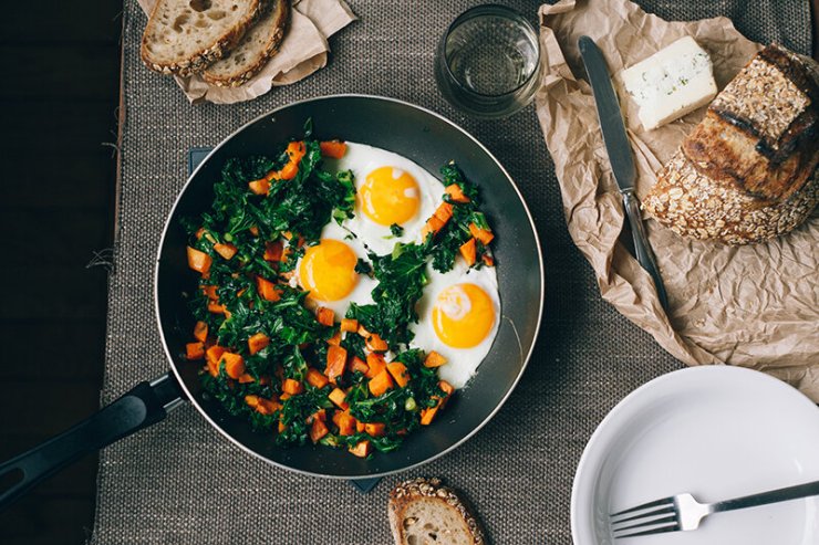 Baked eggs with kale and sweet potatoes
